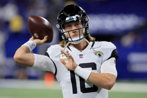 Trevor Lawrence, the No. 1 overall pick of the 2021 NFL Draft, signs with the Jacksonville Jaguars.
